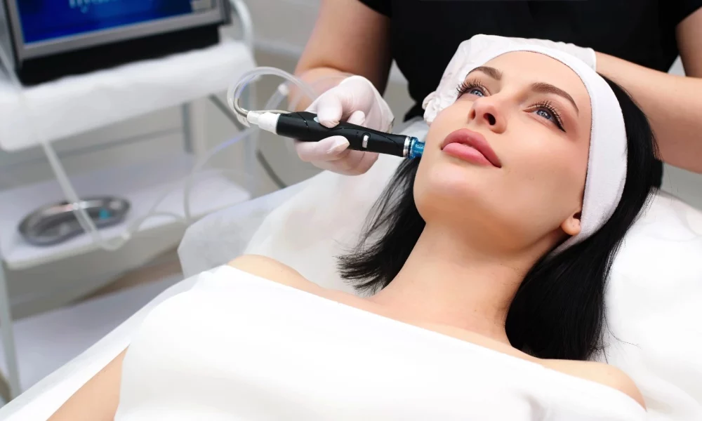 Woman Getting HYdrofacials at Glow Beauty Bar